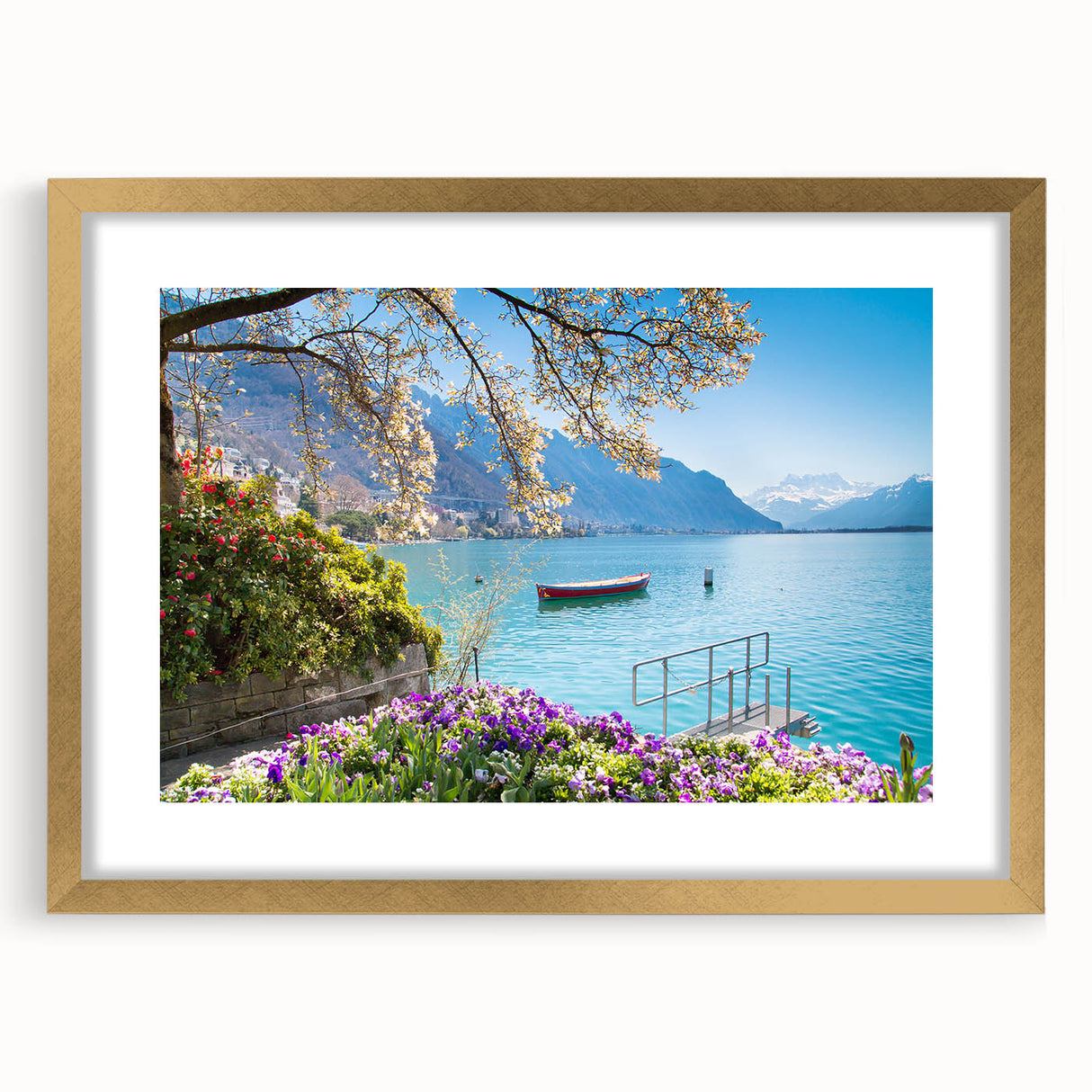 Extra large wall art featuring an abstract print of a Swiss landscape in textured tones of gold and blue, framed with a mat.