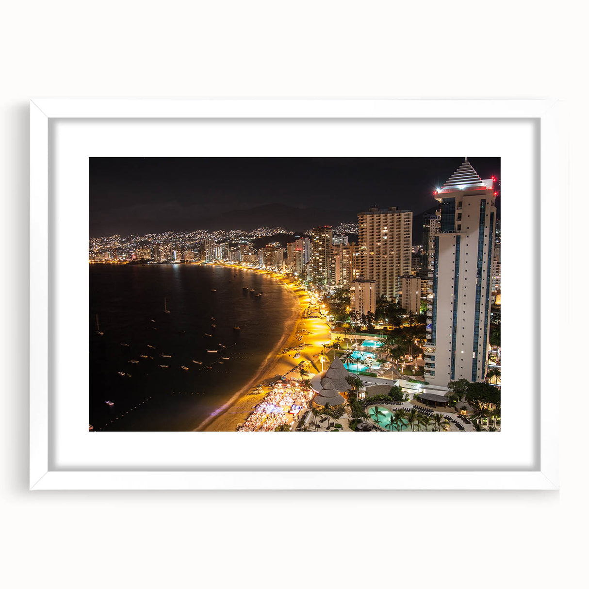 Abstract art print of Acapulco scenery in muted blue and green tones, framed with a white mat, ideal for dining room decor.