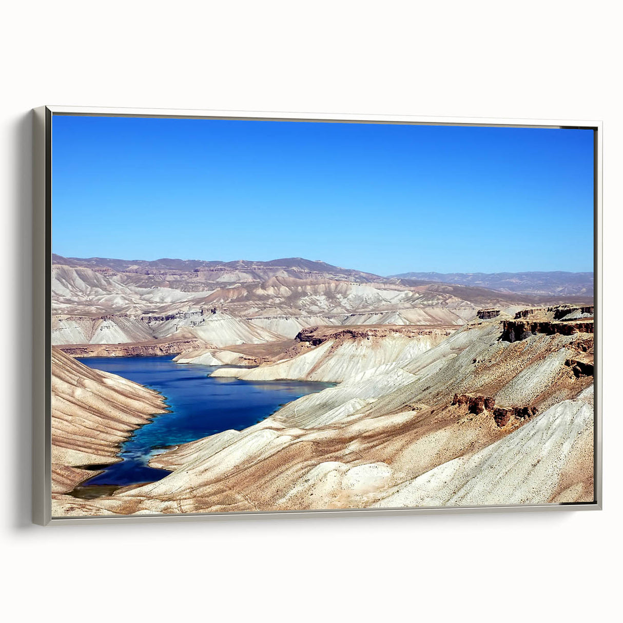 Framed canvas featuring a vintage-style landscape painting of an Afghan scenery, with vibrant colors on a black background.