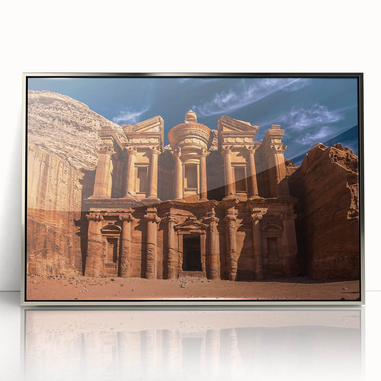 Mid-century modernist art depicting Jordan scenery in muted earth tones on a silver-framed acrylic print.