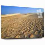 Large abstract depiction of a Middle Eastern landscape in muted earth tones on acrylic glass.