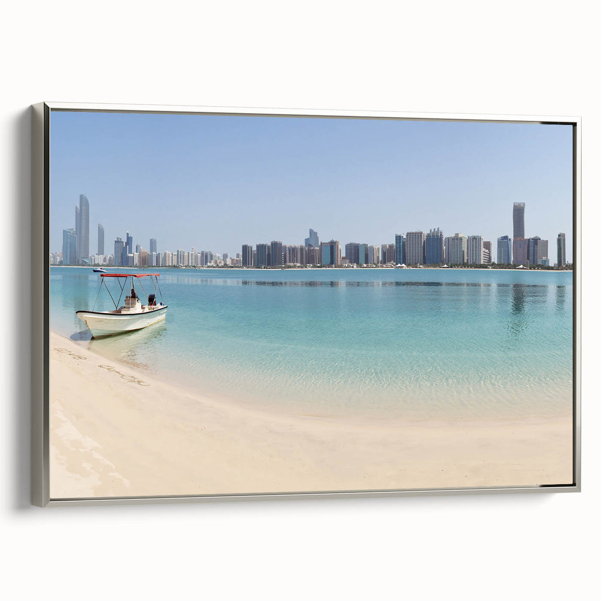 Framed canvas landscape art painting of Abu Dhabi skyline with silver frame, featuring muted earth tones.