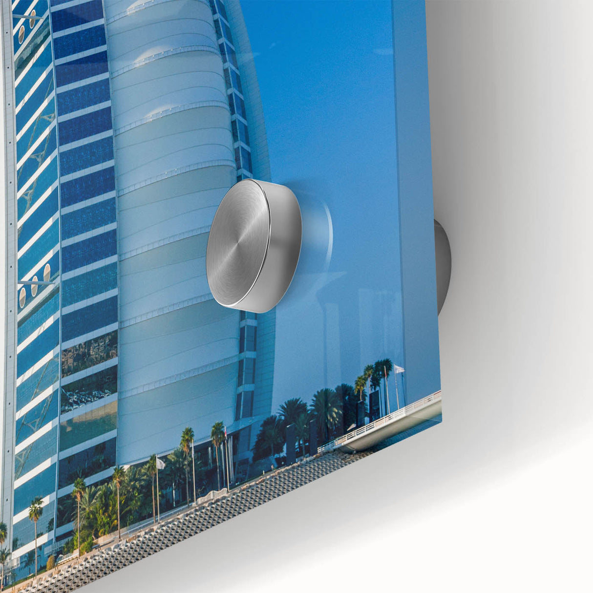 Large abstract wall art of the Burj Al Arab in muted blue and gray tones on acrylic glass, suitable for dining room ambiance.