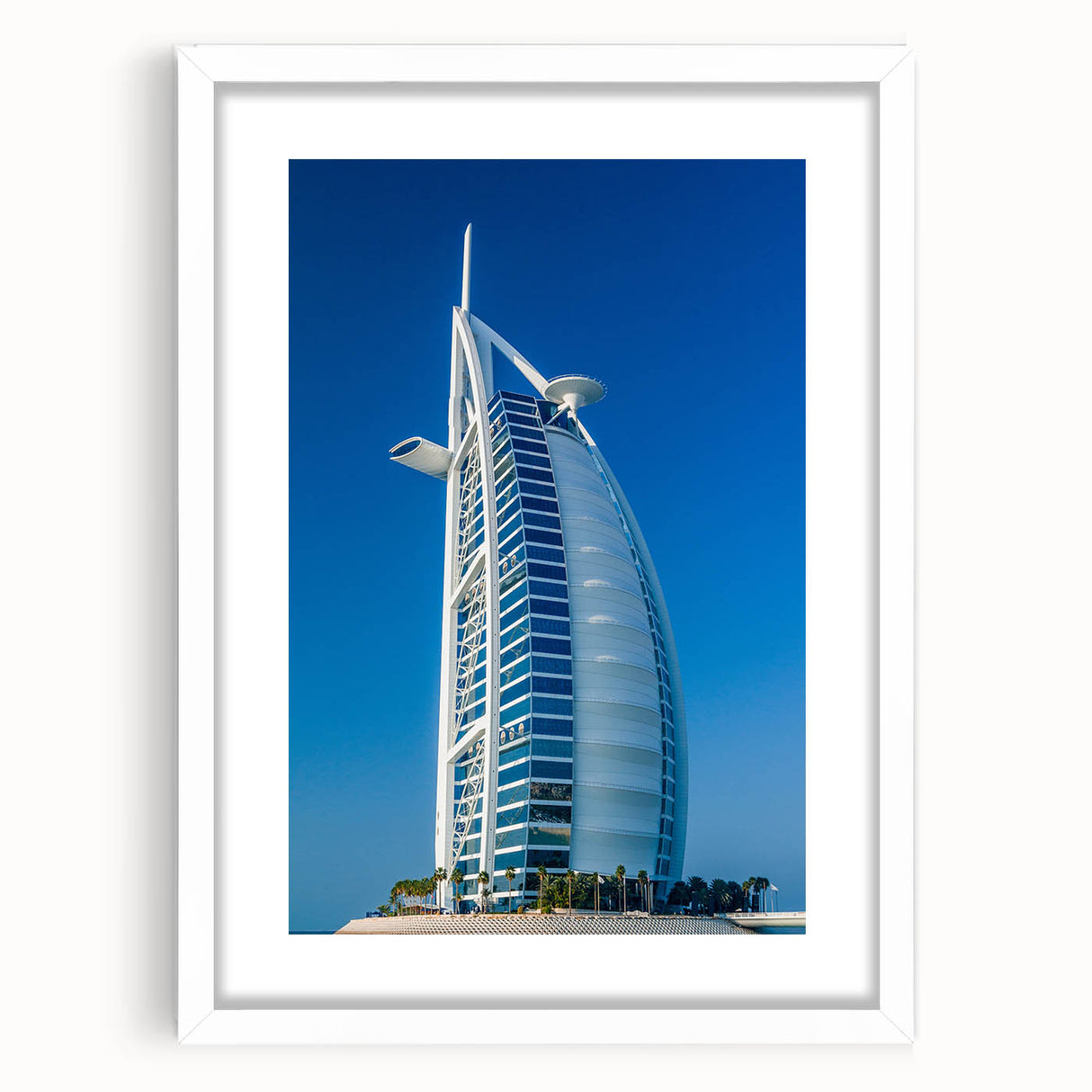 Abstract art print featuring the Burj Khalifa and surrounding skyline in muted gray and blue tones on a framed white mat.