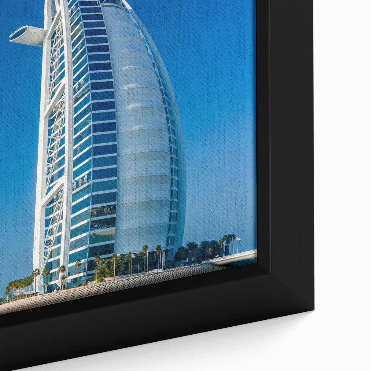 Extra large framed canvas of the Burj Al Arab in textured black with colorful accents, ideal for living room decor.
