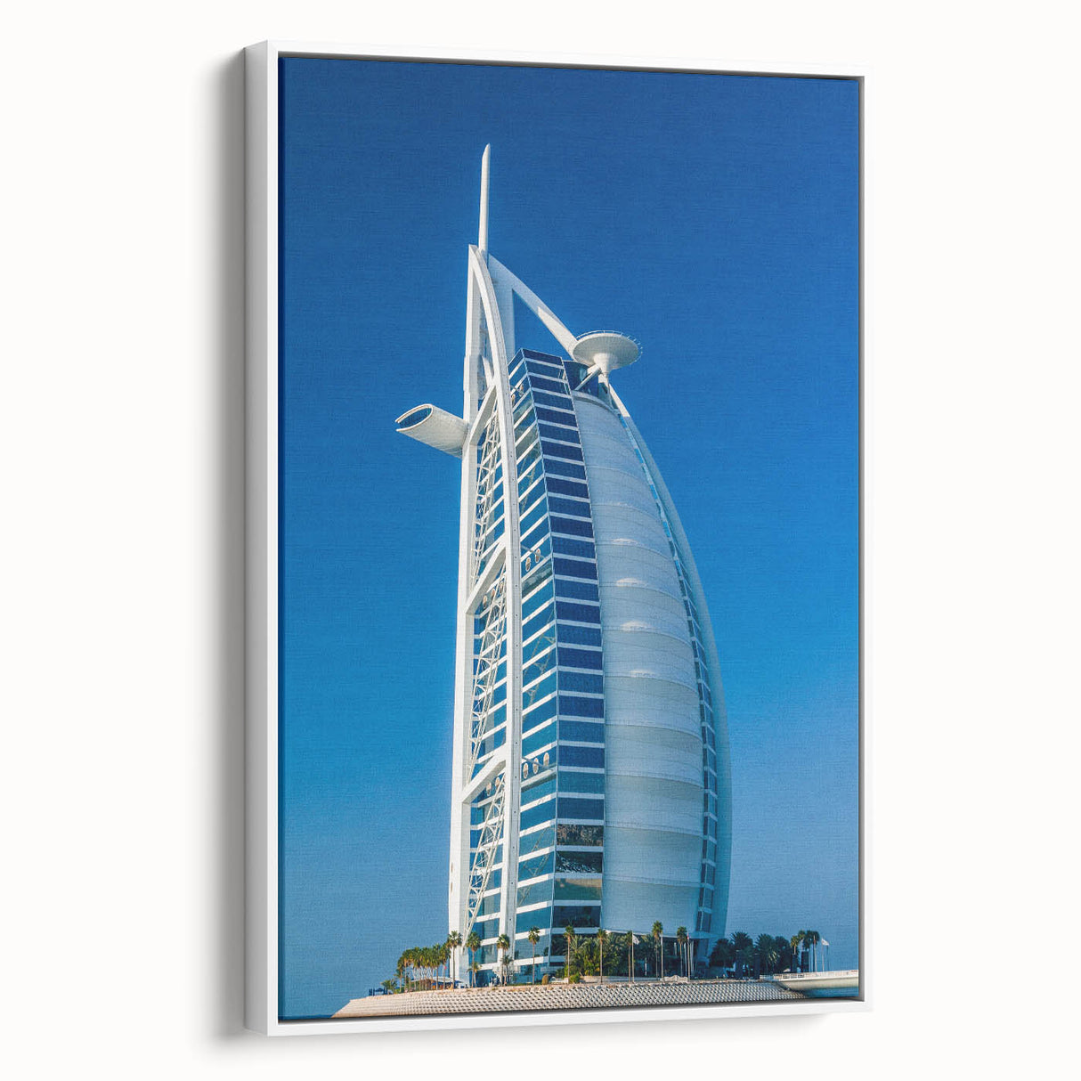 Framed canvas of vintage poster art depicting the Burj Al Arab in colorful hues, ideal for living room decor.