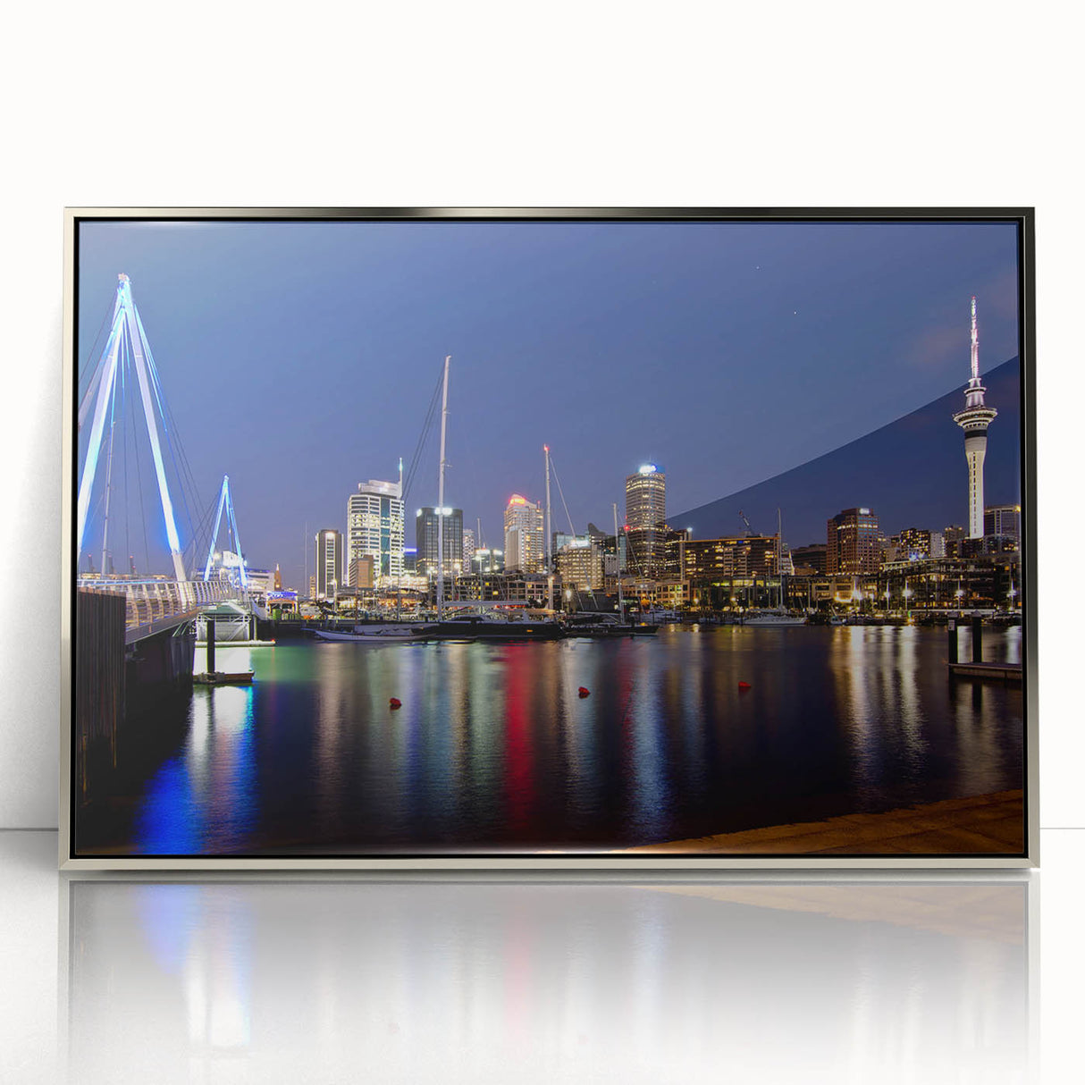 Framed acrylic print of Auckland skyline in muted blue tones, ideal for modern art wall decor.