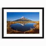 Abstract art print of New Zealand's Taranaki scenery in vibrant colors on a textured, extra large canvas, framed in black.