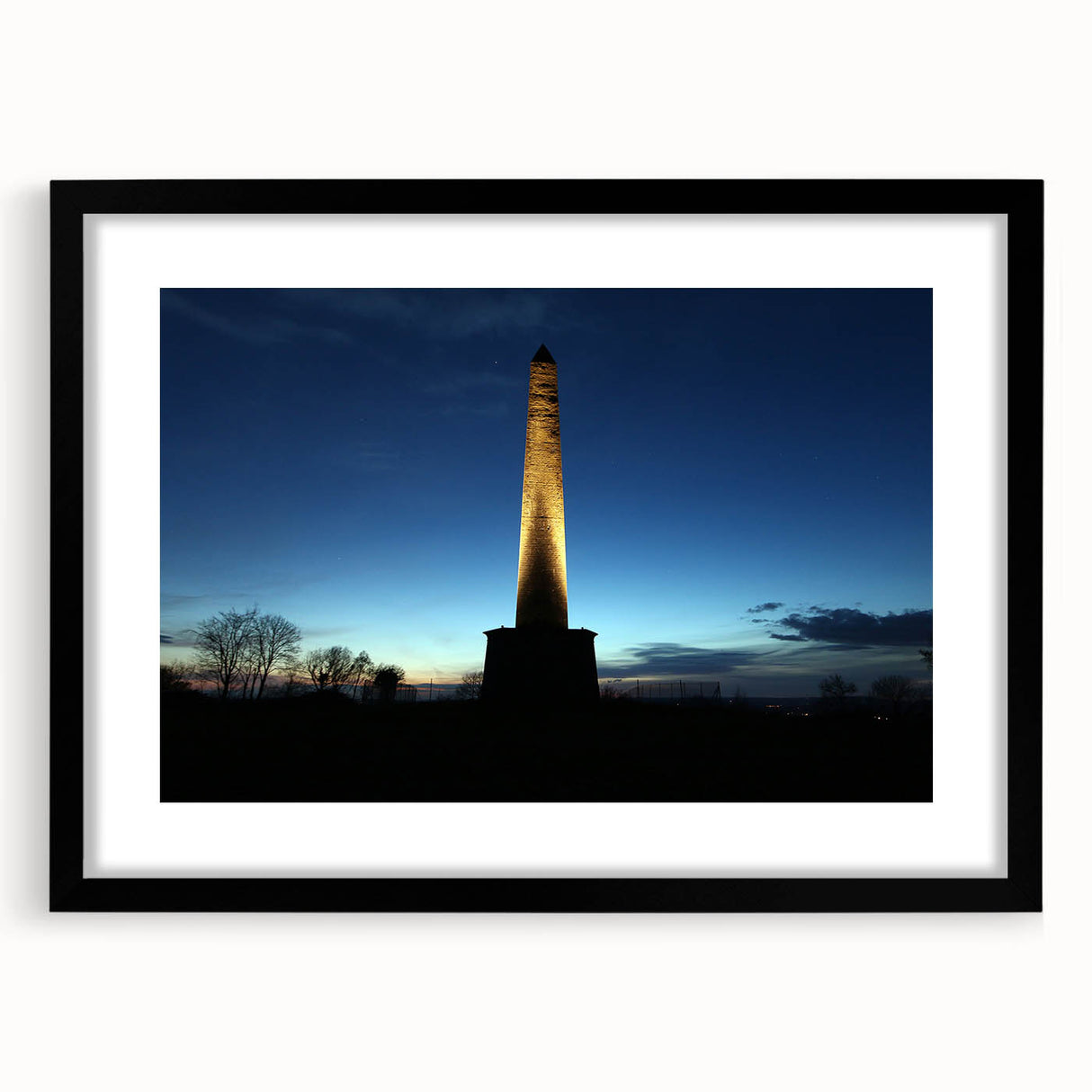 Abstract art print of colorful, textured scenery with vibrant hues on a black-framed, extra large canvas.