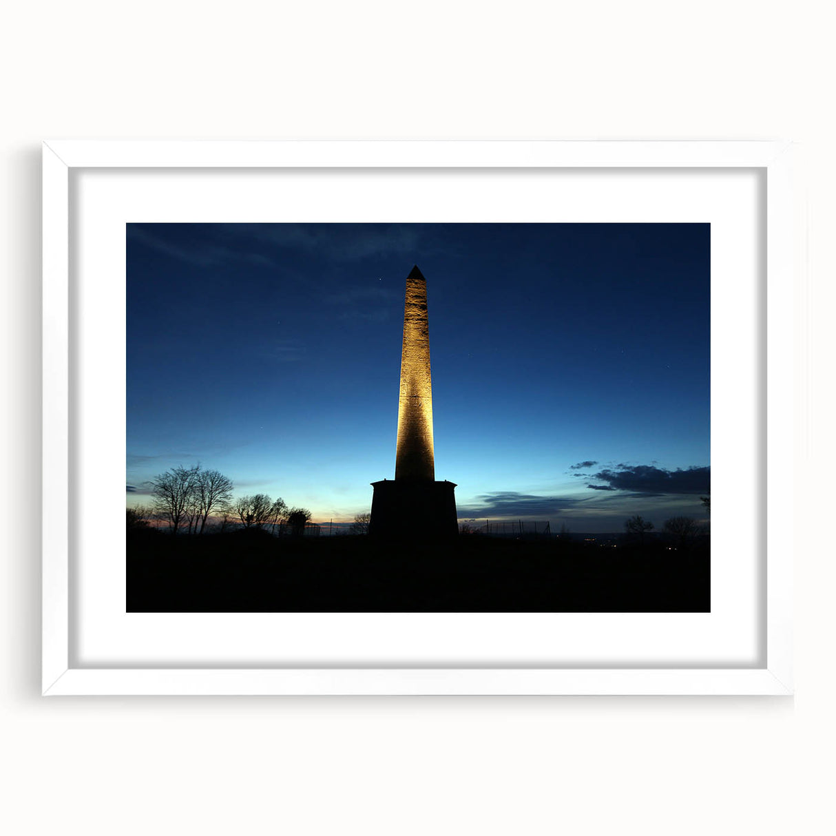 Abstract art print of Wellington skyline in muted blue and gray tones on a white framed canvas.