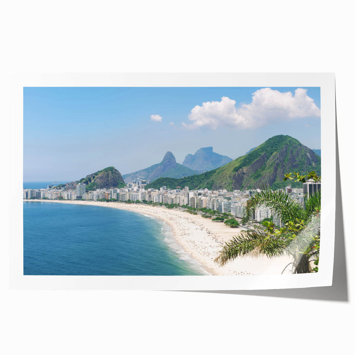 Rolled print of a Brazilian landscape featuring lush greenery and a waterfall, in vibrant green and blue tones.