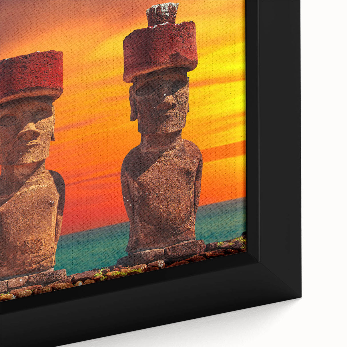 Extra large black wall art featuring a textured depiction of Easter Island statues on a framed canvas, with colorful accents.