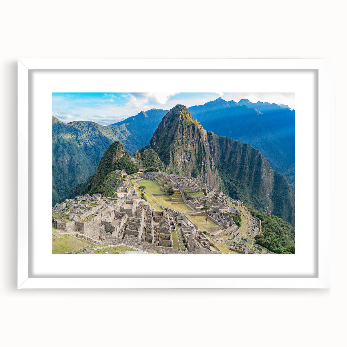 Abstract art print of Machu Picchu with muted earth tones, framed in white, suitable for dining room decor.