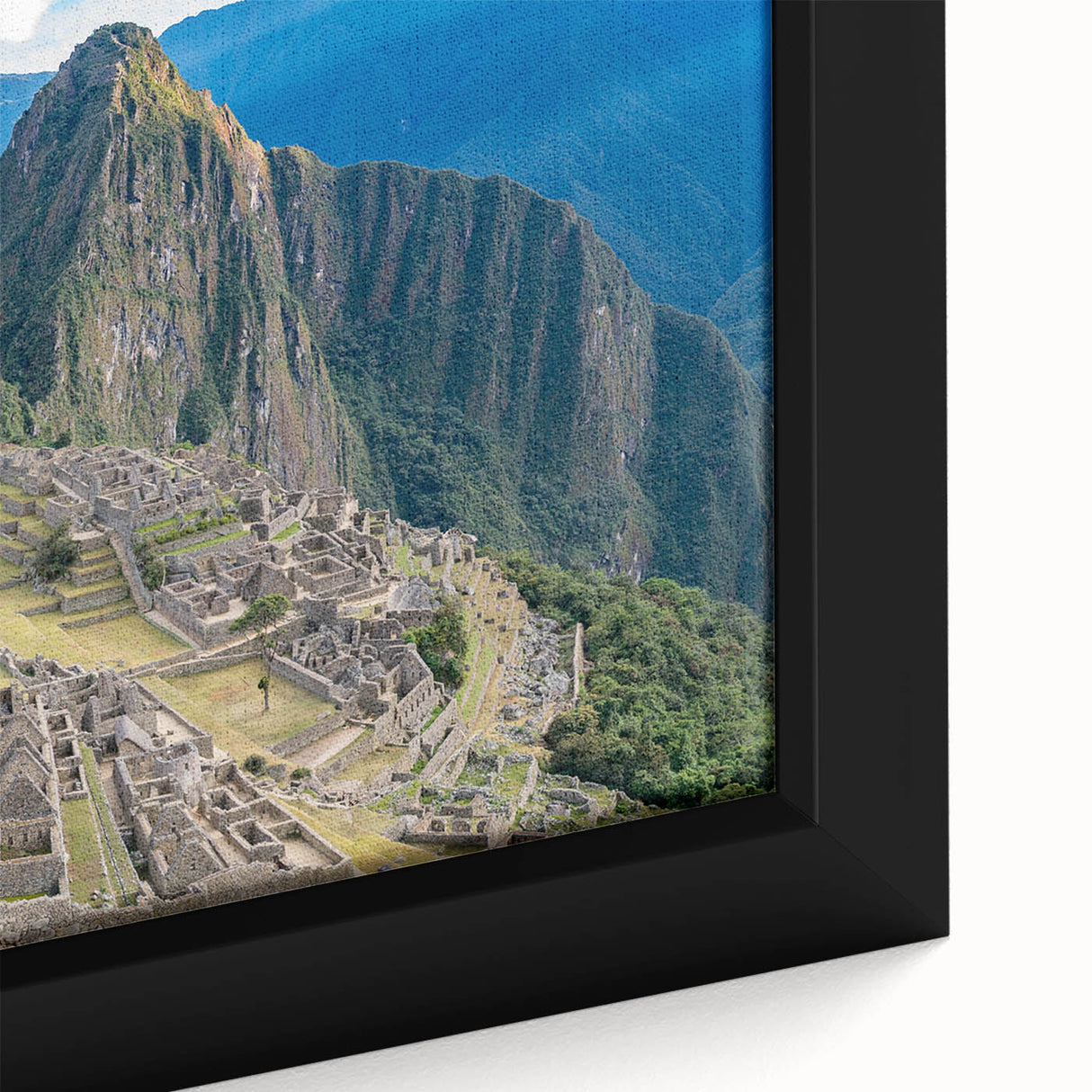 Framed canvas depicting Machu Picchu in vibrant colors and textured style, ideal for living room decor.