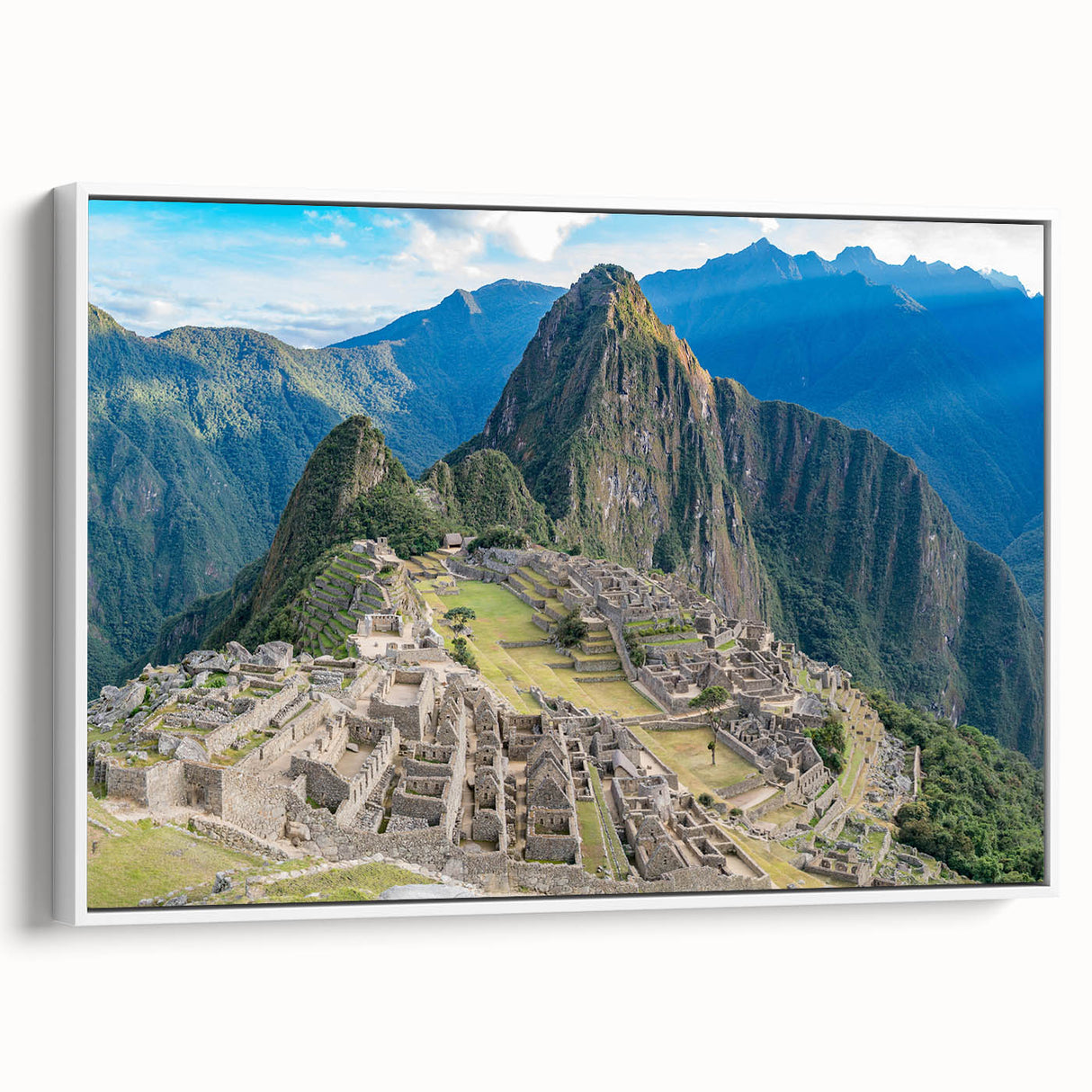 Vintage poster art of Machu Picchu in vibrant colors on a large framed canvas, ideal for living room decor.