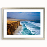 Textured art depicting an abstract scenery of a mountain in Peru, rendered in muted earth tones on a framed silver mat.