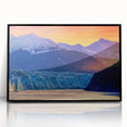 Large abstract wall art of Alaskan scenery in muted earth tones, framed in black acrylic.