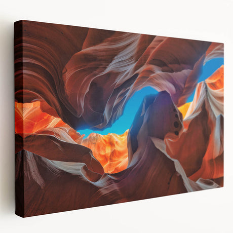 Antelope Canyon in Arizona depicted on a large, stretched canvas with warm orange and red rock formations.
