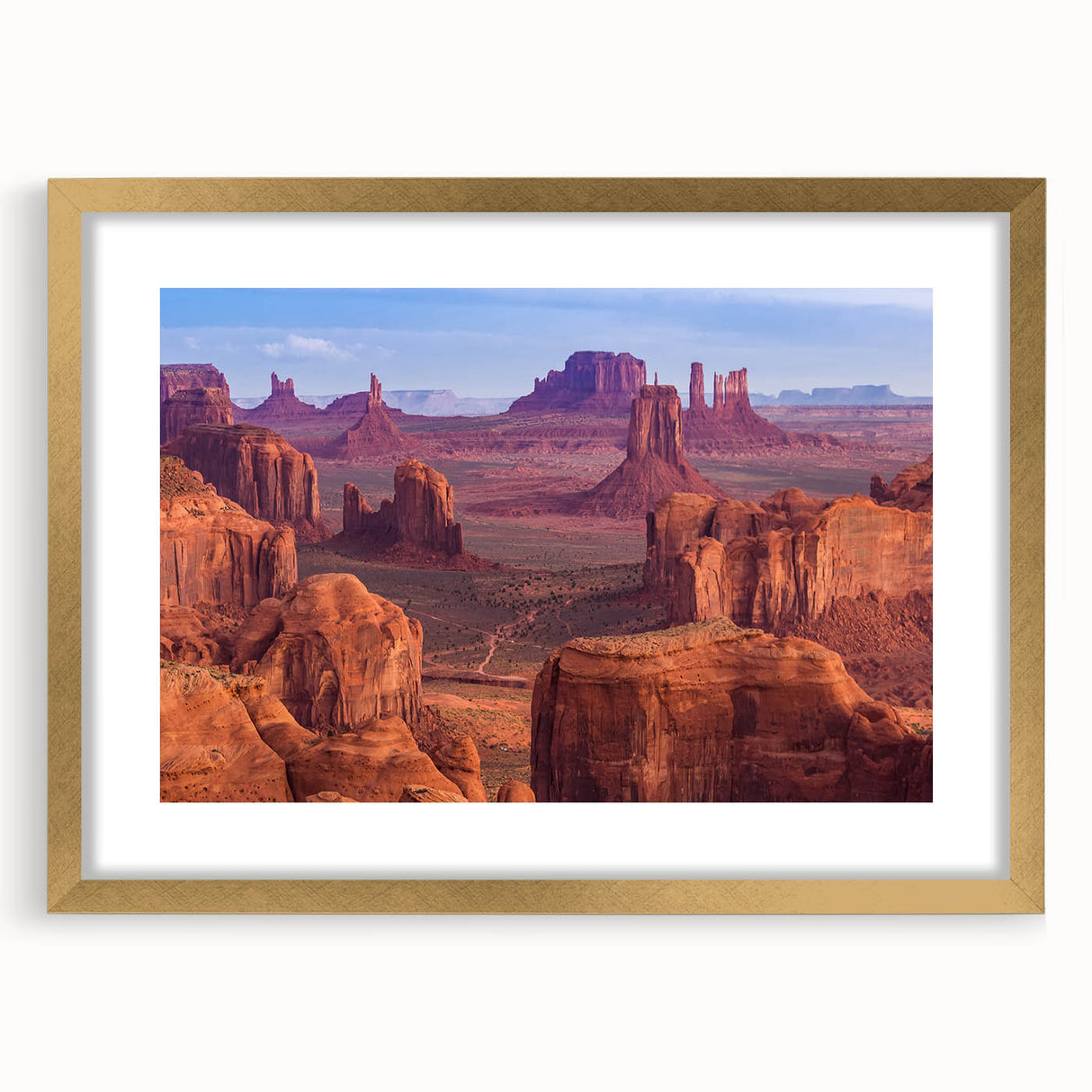 Extra large framed wall art featuring an abstract depiction of the Grand Canyon in textured earth tones.