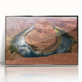 Mid-century modernist art of Arizona's Horseshoe Bend in silver-framed acrylic, featuring earthy tones.