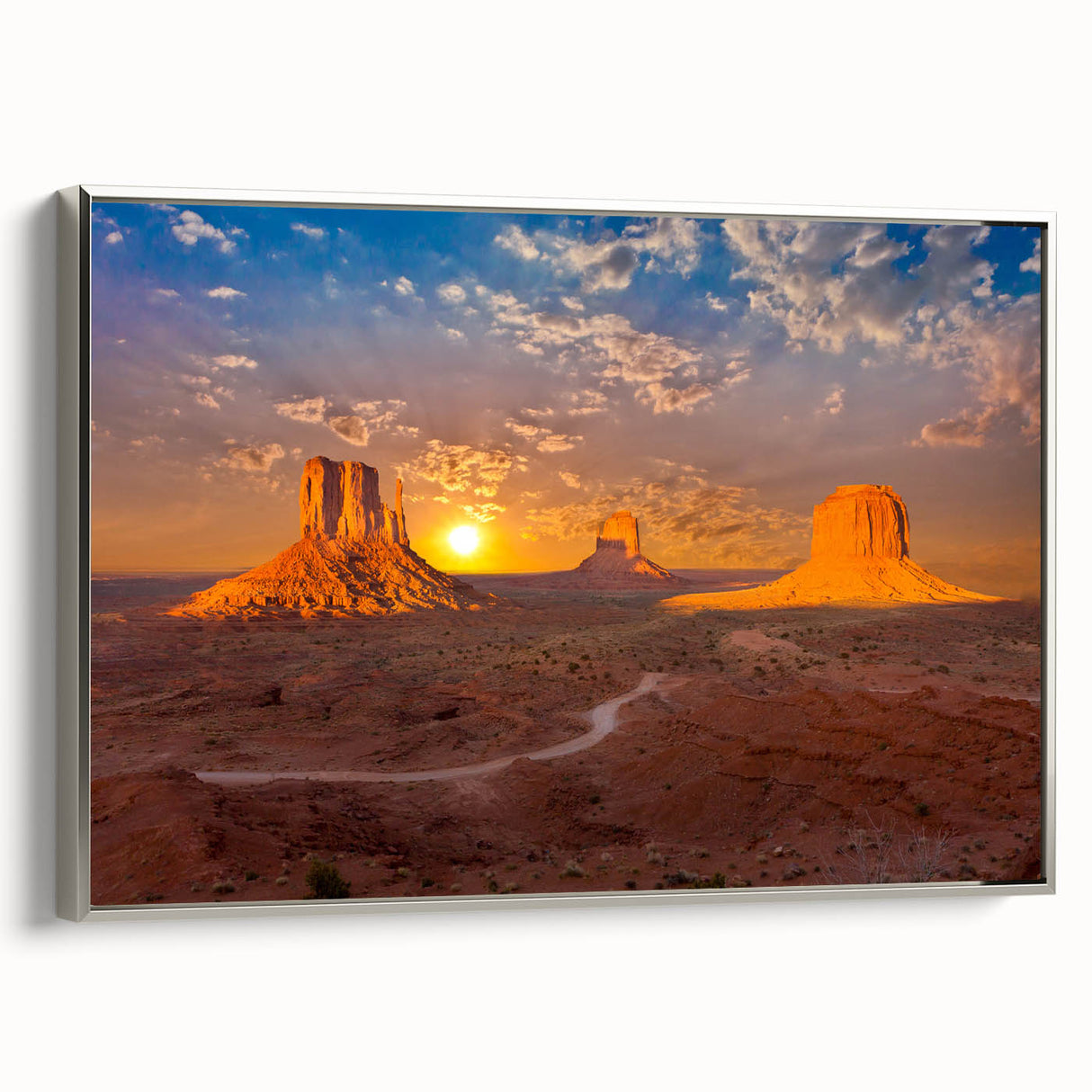 Framed canvas depicting Monument Valley landscape in vibrant colors, ideal for living room decor.