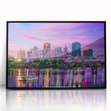 Large abstract wall art depicting a vibrant Arkansas landscape in mid-century modernist style, acrylic print framed in black.