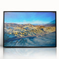 Large abstract wall art depicting Death Valley in muted earth tones, framed in black acrylic.