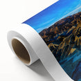 Art deco poster of Death Valley in muted earth tones on rolled canvas, ideal for dining room wall art.
