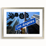 Textured abstract art print depicting the Los Angeles skyline in muted gray tones on a framed silver mat.