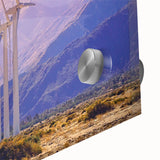 Large abstract wall art featuring palm trees in muted pastel tones on acrylic glass.