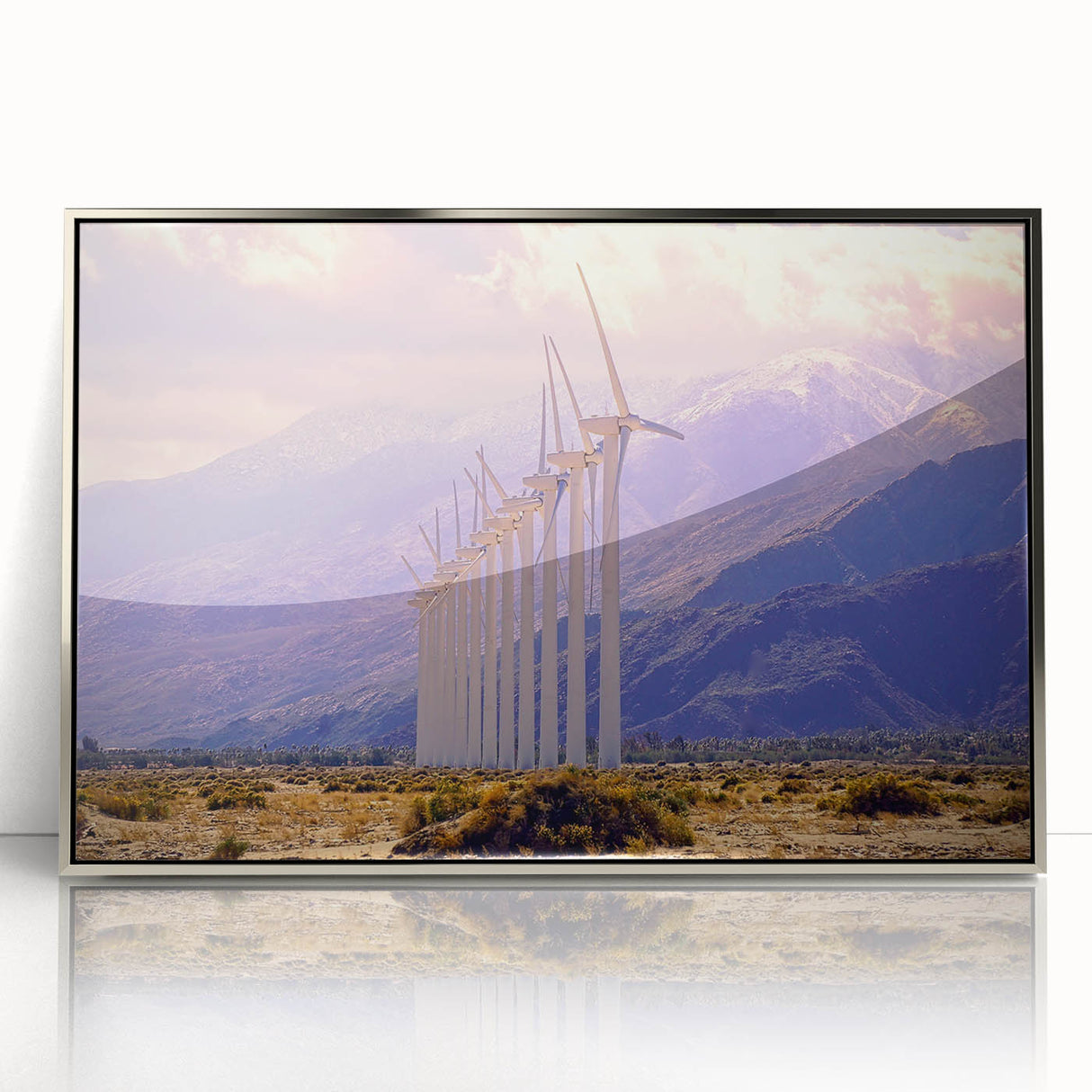 Mid-century modernist art depicting Palm Springs with pastel colors on a silver-framed acrylic print.