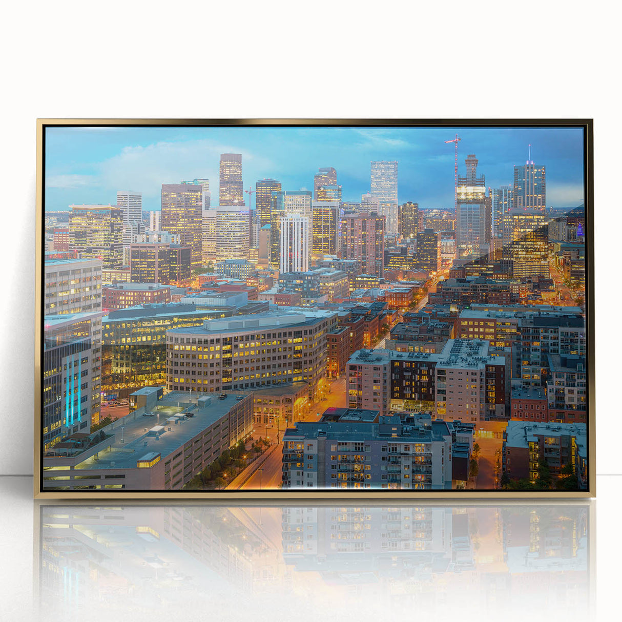 Large art print of Denver skyline in muted gold and blue tones, framed acrylic, ideal for modern nursery wall decor.