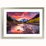 Textured art print of Maroon Bells, Colorado in autumn with vibrant orange and yellow leaves, framed in silver.