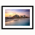 Abstract art print of colorful, textured scenery on a large canvas, framed in black, ideal for living room decor.
