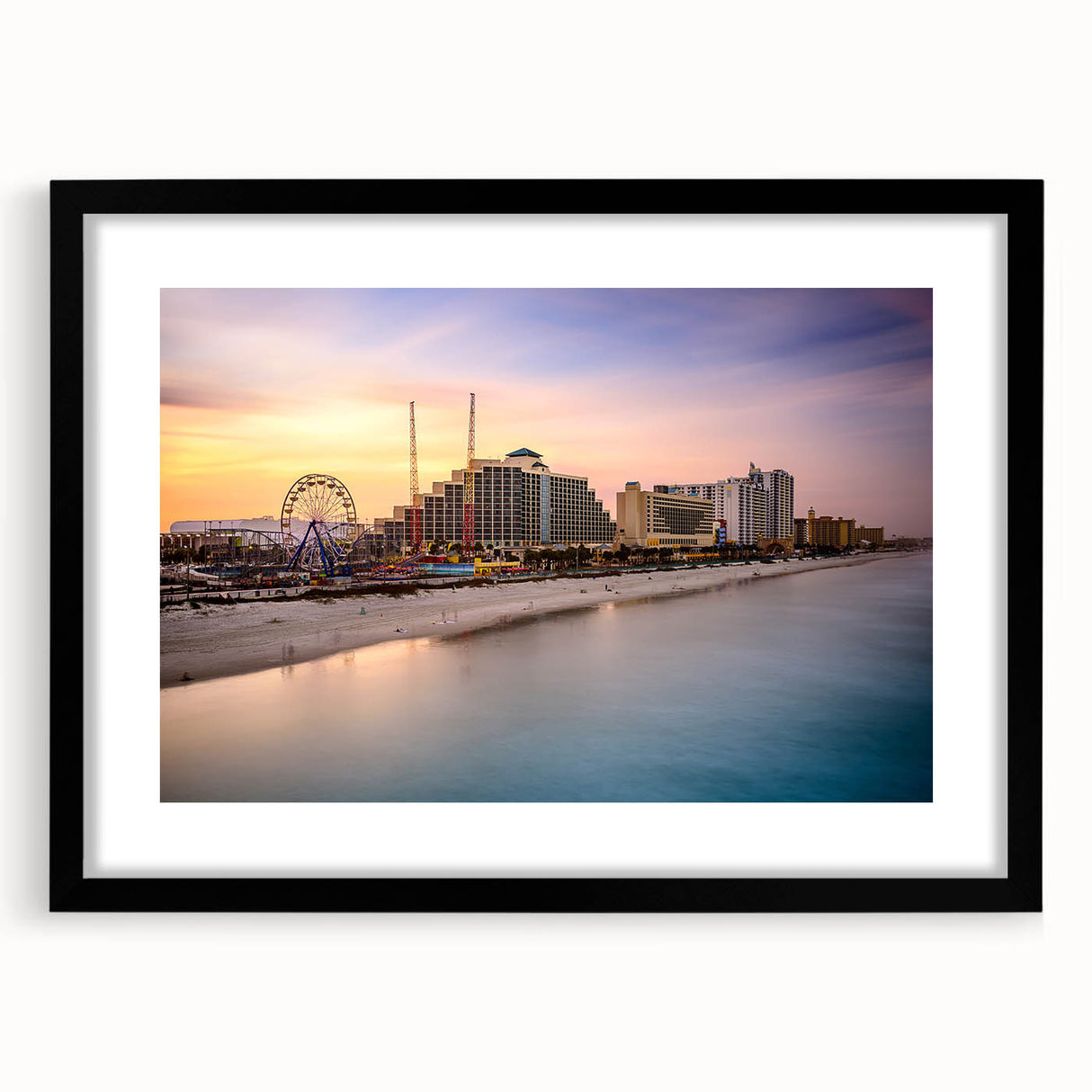 Abstract art print of colorful, textured scenery on a large canvas, framed in black, ideal for living room decor.