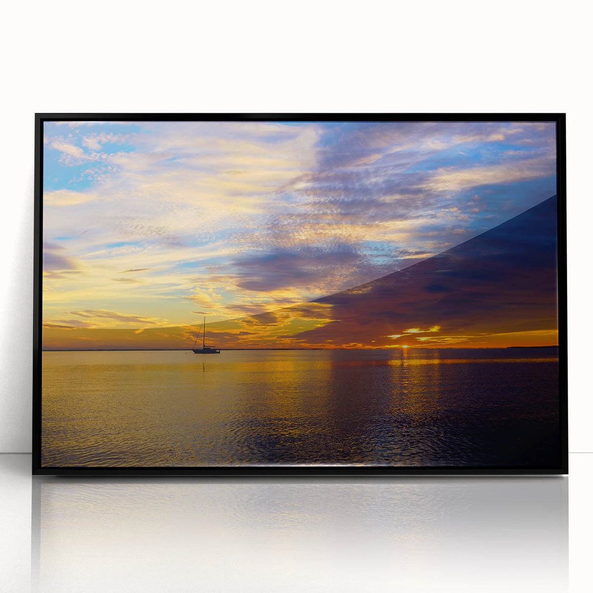 Large abstract wall art depicting the Florida Keys in muted blue and green tones, acrylic print in a black frame.