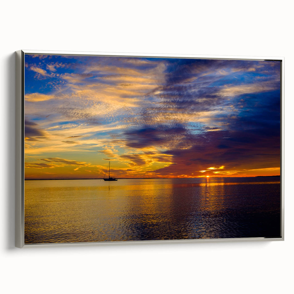 Framed canvas of a landscape art painting depicting the Florida Keys with a vintage poster style in colorful and black tones.