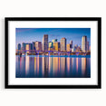 Abstract art print of Miami skyline in vibrant colors on a large framed canvas, suitable for living room decor.