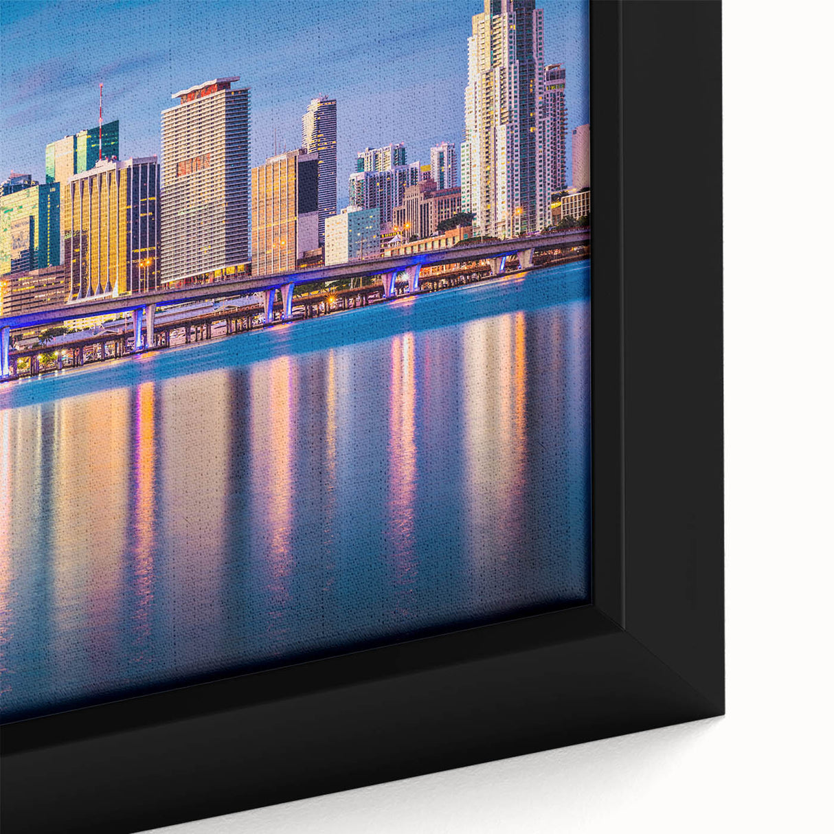 Framed canvas featuring a textured depiction of Miami skyline in black with vibrant, colorful accents.