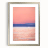 Textured abstract art print of Lake Michigan, featuring muted blue and gray tones on a framed silver mat.