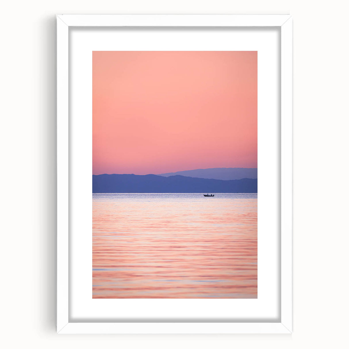 Abstract art print of Lake Michigan with muted blue and gray tones on a white framed canvas.