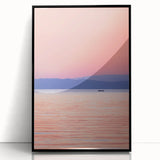 Large abstract wall art of Lake Michigan with mid-century modernist style in muted blue tones, acrylic print framed in black.