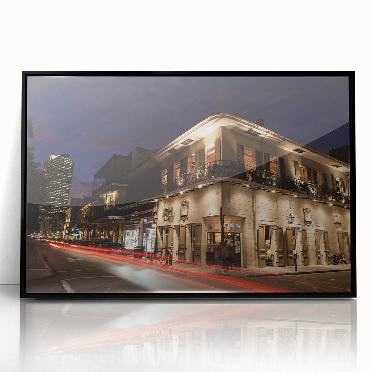 Large abstract wall art depicting a stylized New Orleans skyline in muted gray and blue tones on a framed acrylic.