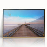 Acrylic print of Chesapeake Bay in muted blue tones, framed in gold, suitable for modern nursery decor.