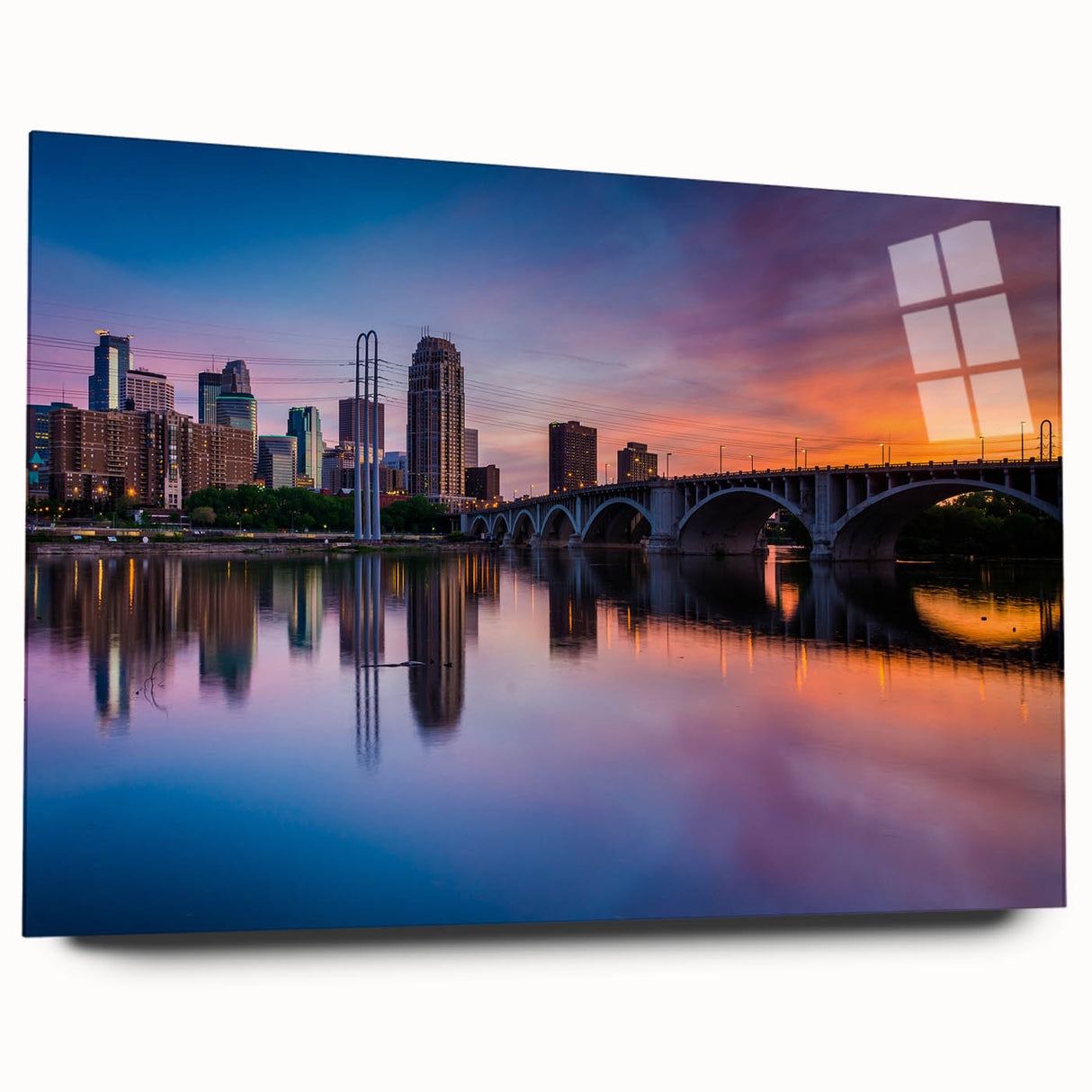 Acrylic print of a large abstract depiction of the Minneapolis skyline in muted blue and gray tones.