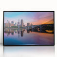 Large abstract wall art of Minneapolis skyline in muted black and gray on framed acrylic, ideal for modern living room decor.