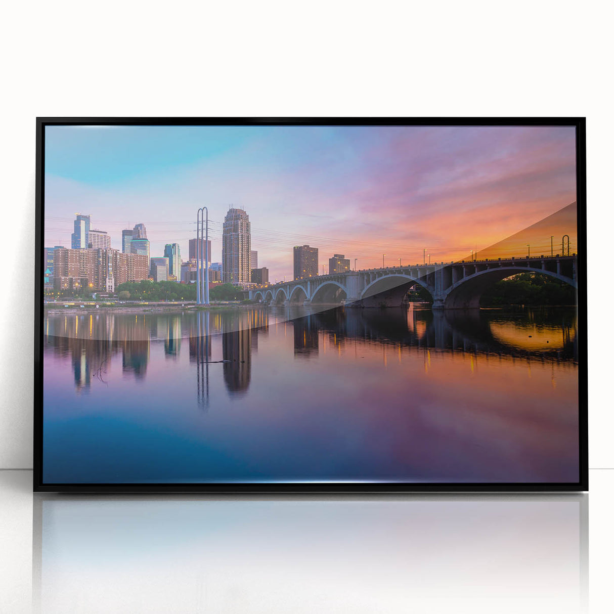 Large abstract wall art of Minneapolis skyline in muted black and gray on framed acrylic, ideal for modern living room decor.