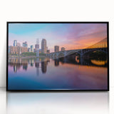 Large abstract wall art of Minneapolis skyline in muted black and gray on framed acrylic, ideal for modern living room decor.