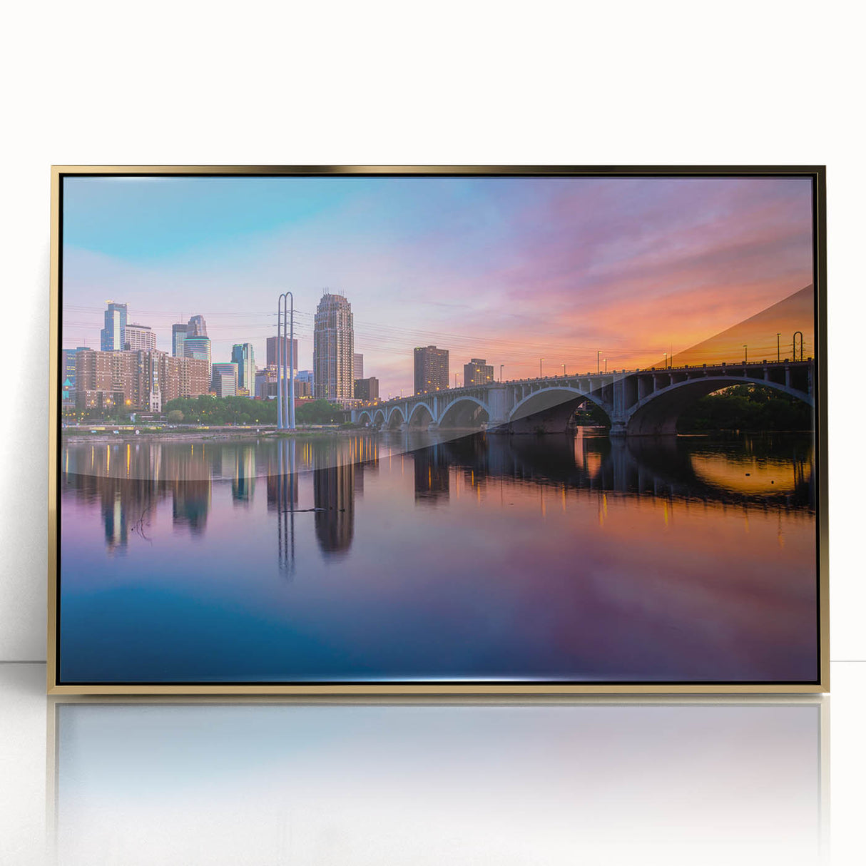 Framed acrylic print of Minneapolis skyline in muted gold and gray tones, suitable for modern art wall decor.