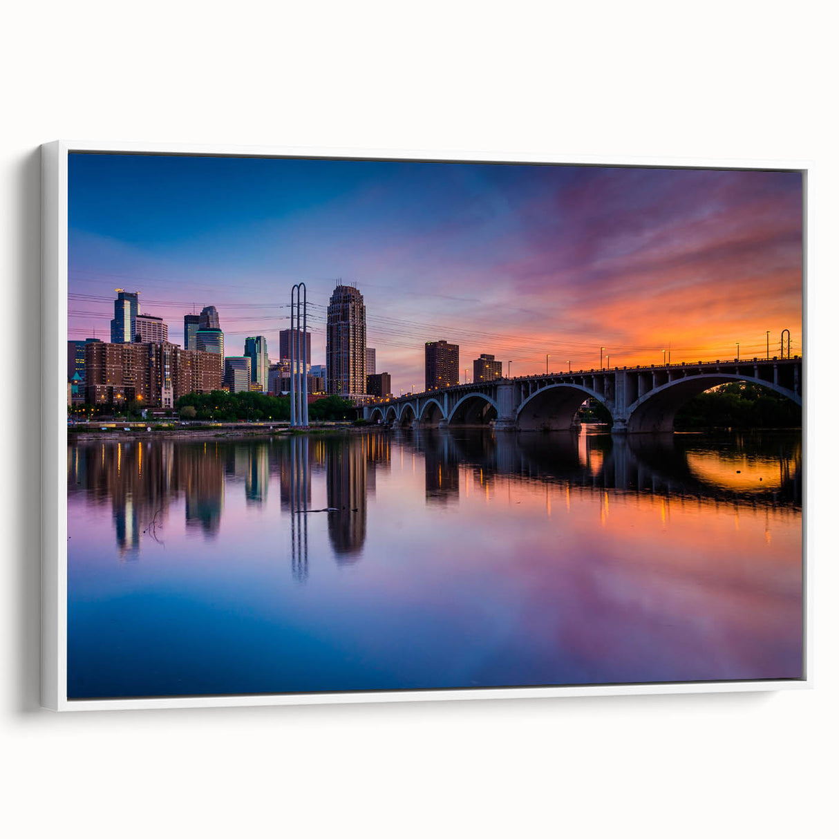 Framed canvas vintage poster art featuring the Minneapolis skyline in colorful hues, ideal for living room decor.